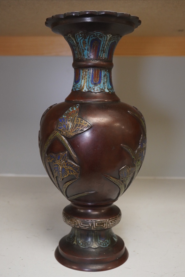 A Japanese bronze and champlevé enamel vase, decorated with irises, 30.5cm high. Condition - fair.